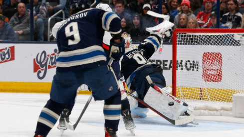 Columbus Blue Jackets goalie Elvis Merzlikins (90) makes a pad save against the Washington Capitals during the second period at Nationwide Arena.