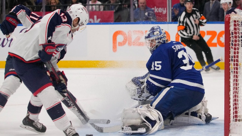 Toronto Maple Leafs goaltender Ilya Samsonov (35) makes a save against Columbus Blue Jackets forward Johnny Gaudreau (13) during overtime at Scotiabank Arena.