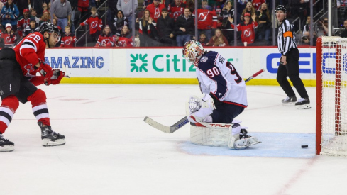 New Jersey Devils right wing Timo Meier (28) scores a goal on Columbus Blue Jackets goaltender Elvis Merzlikins (90) during overtime at Prudential Center.