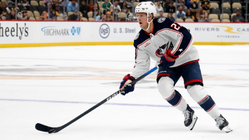 Columbus Blue Jackets defenseman Adam Boqvist (27) skates with the puck against the Pittsburgh Penguins in the shootout at PPG Paints Arena.