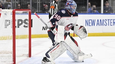 Columbus Blue Jackets' Elvis Merzlikins defends the net against the St. Louis Blues during the second period at Enterprise Center.