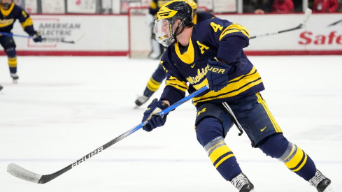 Michigan Wolverines forward Gavin Brindley (4) skates up ice during the NCAA men s hockey game against the Ohio State Buckeyesat Value City Arena.