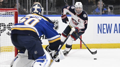 Columbus Blue Jackets' Boone Jenner skates against the St. Louis Blues during the third period at Enterprise Center.