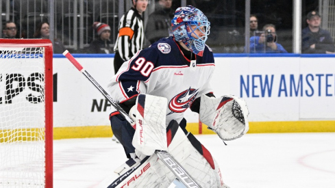 Columbus Blue Jackets goaltender Elvis Merzlikins (90) defends the net against the St. Louis Blues during the second period at Enterprise Center.