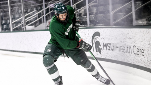 Michigan State's Artyom Levshunov moves the puck in practice during hockey media day on Wednesday, Sept. 27, 2023, at Munn Arena in East Lansing.
