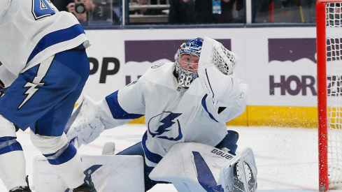 Tampa Bay Lightning goalie Andrei Vasilevskiy (88) makes a glove save against the Columbus Blue Jackets during the second period at Nationwide Arena.