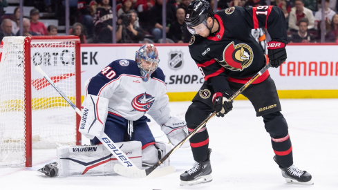 Ottawa Senators right wing Drake Batherson handles the puck in front of Columbus Blue Jackets goalie Daniil Tarasov