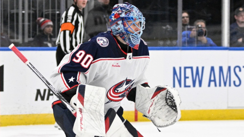 Columbus Blue Jackets goaltender Elvis Merzlikins (90) defends the net against the St. Louis Blues during the second period at Enterprise Center. 