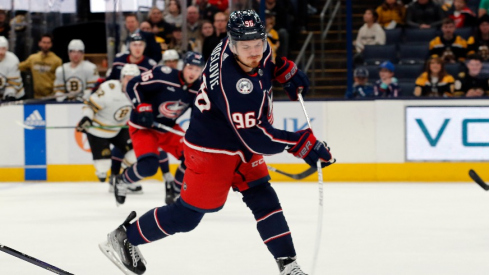 Columbus Blue Jackets center Jack Roslovic (96) wrists a shot on goal against the Boston Bruins during the third period at Nationwide Arena.