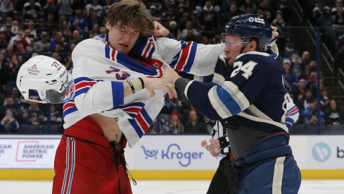 Columbus Blue Jackets' Mathieu Olivier and New York Rangers' Matt Rempe fight during the first period at Nationwide Arena.