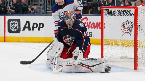 Columbus Blue Jackets goalie Daniil Tarasov (40) makes a glove save as Edmonton Oilers center Zach Hyman (18) looks for a rebound during the third period at Nationwide Arena.