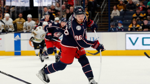 Columbus Blue Jackets center Jack Roslovic (96) wrists a shot on goal against the Boston Bruins during the third period at Nationwide Arena.