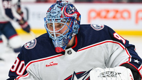 Columbus Blue Jackets goalie Elvis Merzlikins (90) looks on during warm-up before the game against the Montreal Canadiens at Bell Centre.