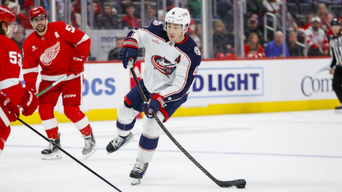 Columbus Blue Jackets' Zach Werenski handles the puck during the first period of the game against the Detroit Red Wings at Little Caesars Arena.