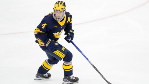 Michigan Wolverines forward Gavin Brindley (4) skates against the Ohio State Buckeyes during the NCAA men s hockey game at Value City Arena.