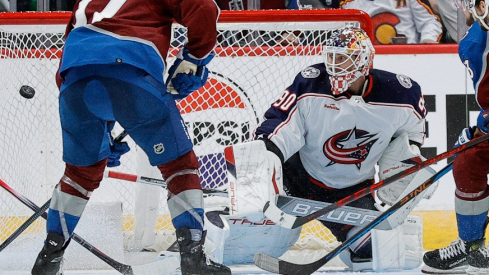 Colorado Avalanche right wing Valeri Nichushkin (13) scores a goal past Columbus Blue Jackets goaltender Elvis Merzlikins (90) as defenseman Damon Severson (78) and center Casey Mittelstadt (37) and left wing Johnny Gaudreau (13) look on in the third period at Ball Arena.