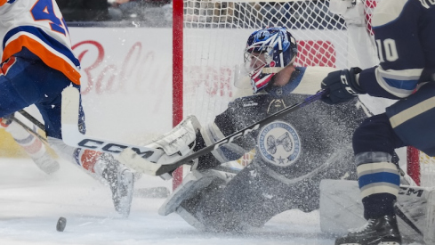 Columbus Blue Jackets' Jet Greaves makes a save in net against the New York Islanders in the second period at Nationwide Arena.