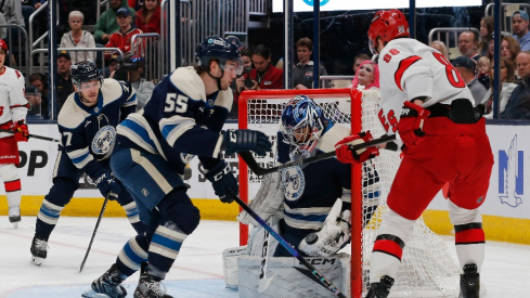 Columbus Blue Jackets goalie Jet Greaves (73) stops the shot attempt of Carolina Hurricanes center Martin Necas (88) during the first period at Nationwide Arena.