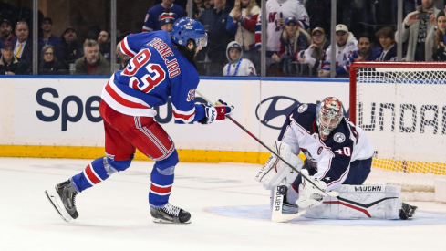 New York Rangers center Mika Zibanejad (93) takes a shot at Columbus Blue Jackets goalie Daniil Tarasov (40) in a shootout at Madison Square Garden.