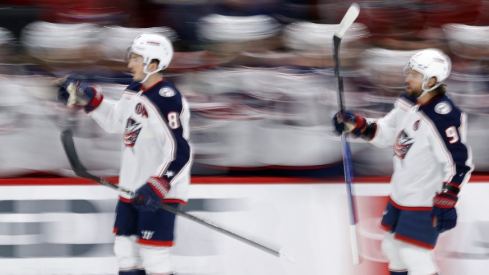 Columbus Blue Jackets defenseman Zach Werenski (8) celebrates after scoring a goal against the Washington Capitals in the first period at Capital One Arena.