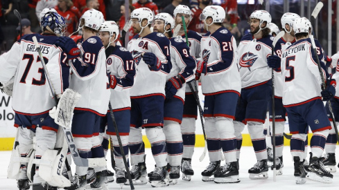 Columbus Blue Jackets goaltender Jet Greaves (73) celebrates with teammates after their game against the Washington Capitals at Capital One Arena.