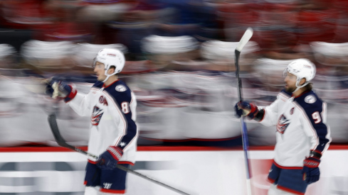 Zach Werenski celebrates after scoring a goal 