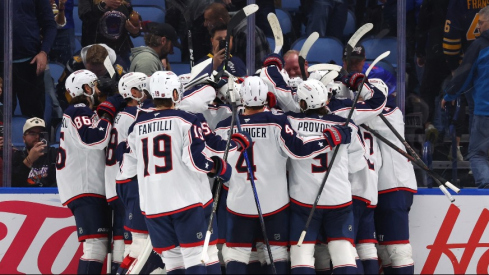 Miles Wood returned to the lineup and scored two goals Tuesday night, including the overtime winner, in the Blue Jackets' 4-3 win over the Buffalo Sabres.