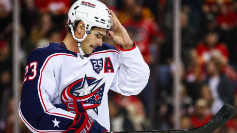Nov 5, 2025; Calgary, Alberta, CAN; Columbus Blue Jackets center Sean Monahan (23) against the Calgary Flames during the first period at Scotiabank Saddledome.
