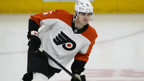 Mar 23, 2025; Chicago, Illinois, USA; Philadelphia Flyers defenseman Egor Zamula (5) warms up before a game against the Chicago Blackhawks at United Center.