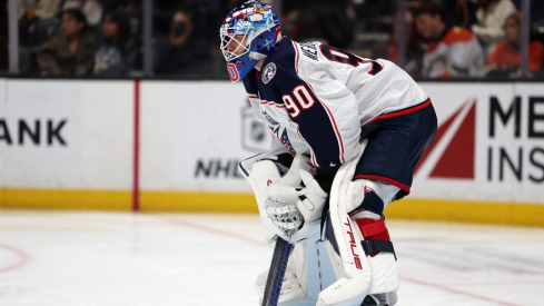 Dec 20, 2025; Anaheim, California, USA; Columbus Blue Jackets goaltender Elvis Merzlikins (90) looks on during the second period against the Anaheim Ducks at Honda Center.