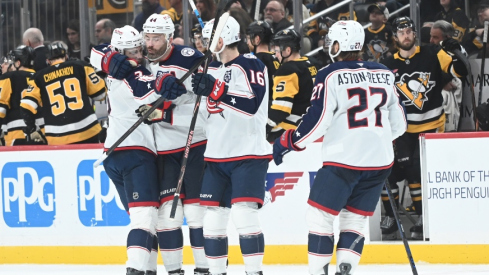 Jan 17, 2026; Pittsburgh, Pennsylvania, USA; Columbus Blue Jackets right wing Charlie Coyle (3) celebrates his shoot out goal with defenseman Erik Gudbranson (44) and Brendan Gaunce (16) and left wing Zach Aston-Reese after scoring on Pittsburgh Penguins goalie Arturs Silovs (37) in a shoot out at PPG Paints Arena. Columbus won 4-3.