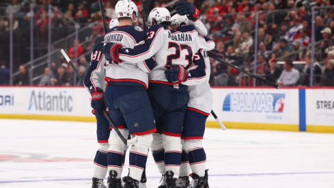 Feb 3, 2026; Newark, New Jersey, USA; Columbus Blue Jackets defenseman Dante Fabbro (15) celebrates his goal against the New Jersey Devils during the third period at Prudential Center.