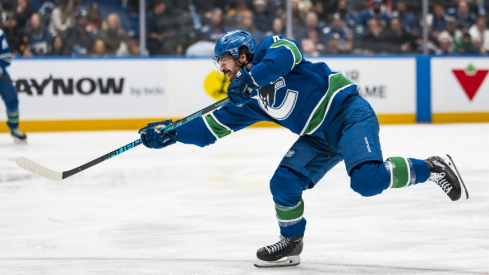 The Columbus Blue Jackets have acquired forward Conor Garland from the Vancouver Canucks in exchange for a pair of draft picks.