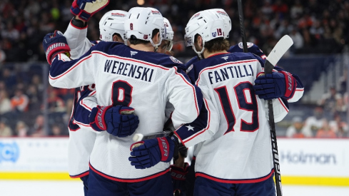Mar 24, 2026; Philadelphia, Pennsylvania, USA; Columbus Blue Jackets defenseman Zach Werenski (8) celebrates with teammates after scoring a goal against the Philadelphia Flyers in the second period at Xfinity Mobile Arena.