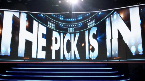 Jun 27, 2025; Los Angeles, California, USA; The video board shows the 20th overall pick for the Columbus Blue Jackets is about to be announced in the first round of the 2025 NHL Draft at Peacock Theater. Mandatory Credit: Kirby Lee-Imagn Images