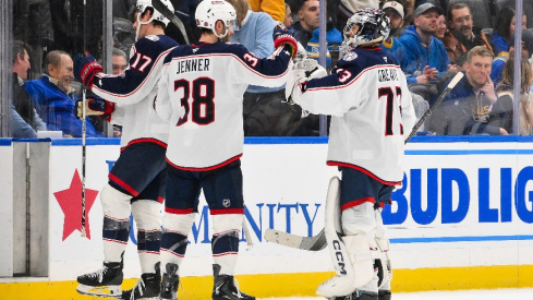 Jan 31, 2026; St. Louis, Missouri, USA; Columbus Blue Jackets goaltender Jet Greaves (73) and center Boone Jenner (38) celebrate after the Blue Jackets defeated the St. Louis Blues at Enterprise Center. Mandatory Credit: Jeff Curry-Imagn Images