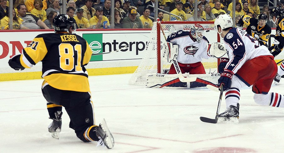 Pittsburgh Penguins right wing Phil Kessel shoots and scores over the glove of Columbus Blue Jackets goalie Sergei Bobrovsky.