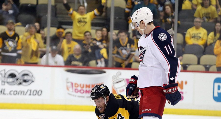 Columbus Blue Jackets left wing Matt Calvert (11) reacts after cross checking Pittsburgh Penguins right wing Tom Kuhnhackl.