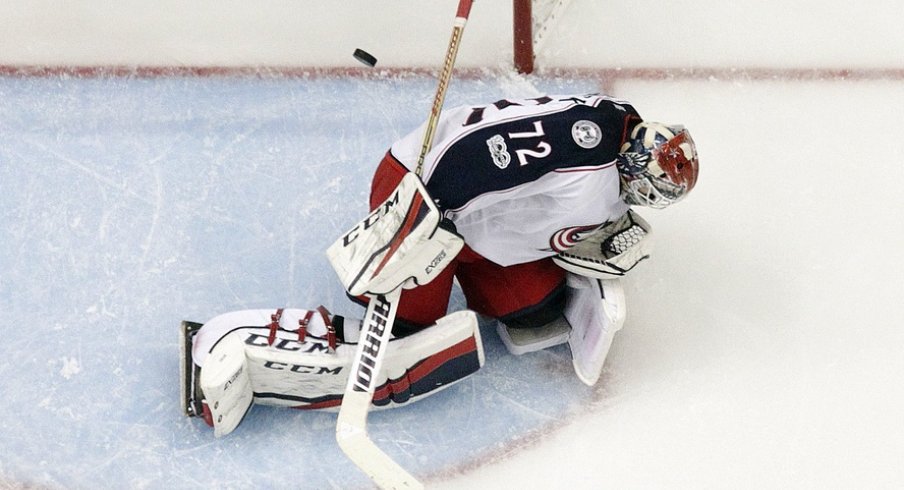 Sergei Bobrovsky lets a puck slip by in Game 2 against the Penguins