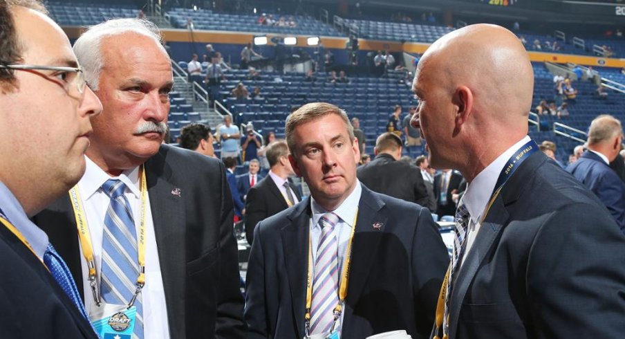 John Davidson and Jarmo Kekalainen talk at the draft