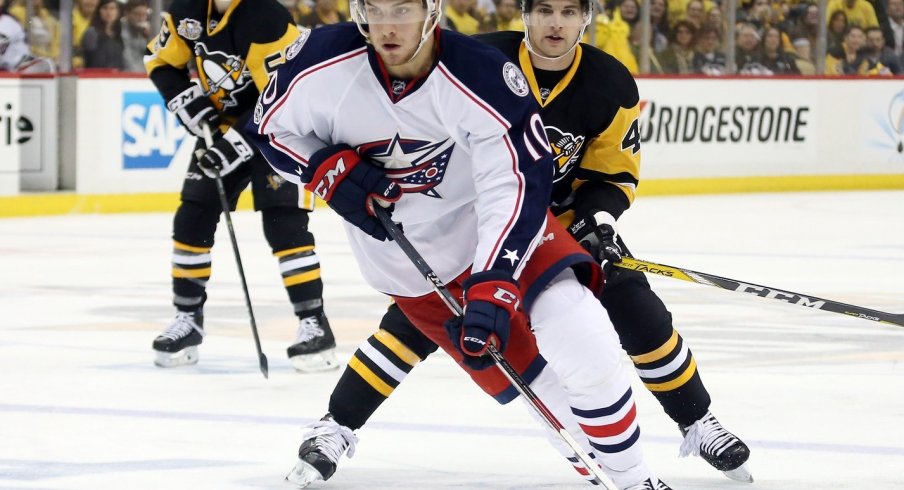 Alexander Wennberg skating away from the Penguins in the 2017 Stanley Cup Playoffs