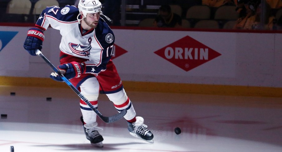 Brandon Dubinsky skates alone during pre-game warm ups.