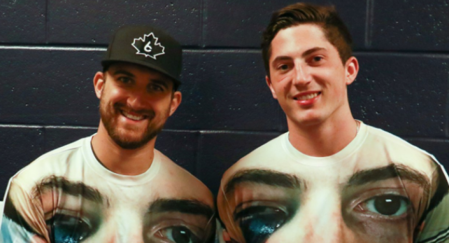 Zach Werenski and Nick Foligno pose for a picture in Werenski's now infamous t-shirt