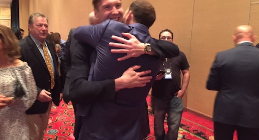 Nick Foligno and Sergei Bobrovsky embrace after Foligno's win