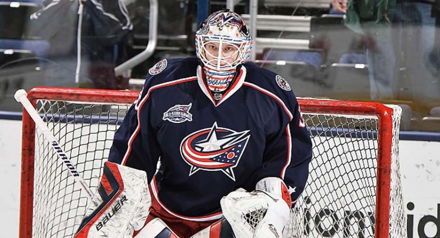 Oscar Dansk gets ready for the puck during the preseason.