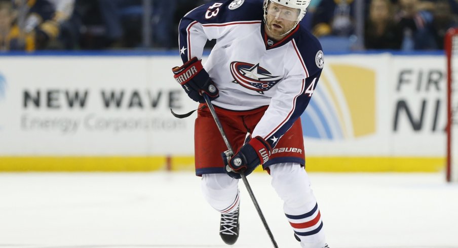 Scott Hartnell skates the puck up the ice.