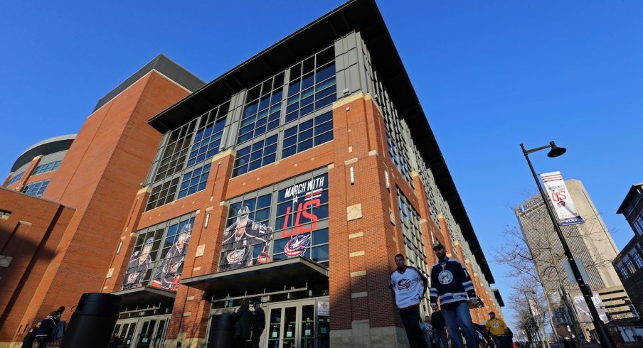 Columbus Blue Jackets' fans get ready to enter Nationwide Arena for a game.