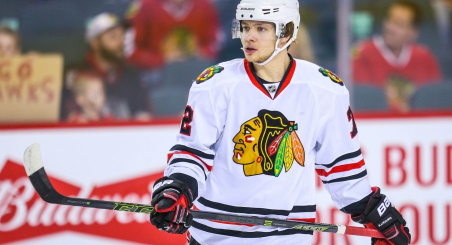 Artemi Panarin skates around during pre-game warm ups