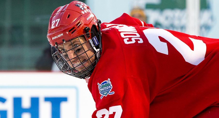 Doyle Somerby waits for the puck to drop while playing at Fenway Park