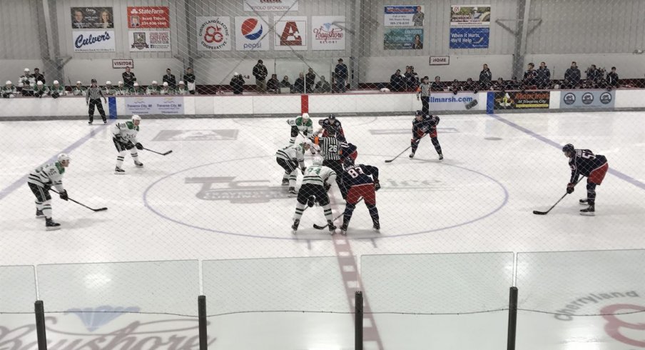 The Columbus Blue Jackets wait for the puck to drop during their first game in Traverse City against the Dallas Stars